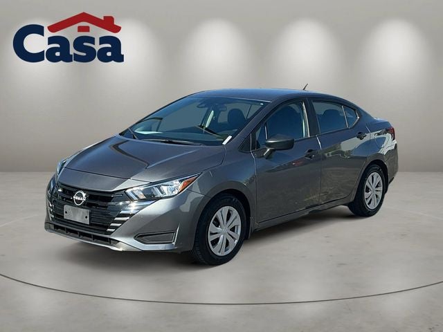 2023 Nissan Versa 1.6 S in Gun Metallic — front three-quarter view