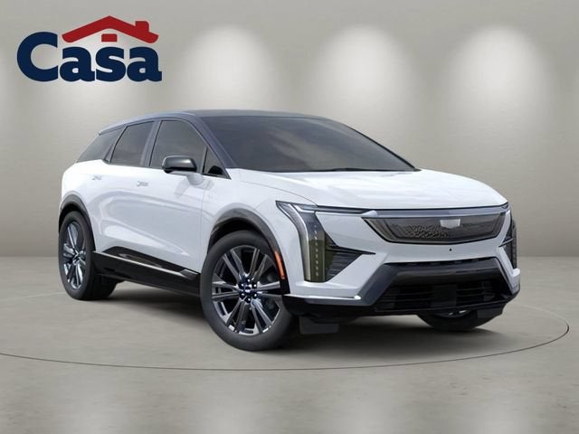 2026 Cadillac OPTIQ Premium Sport in Vibrant White Tricoat — front three-quarter view
